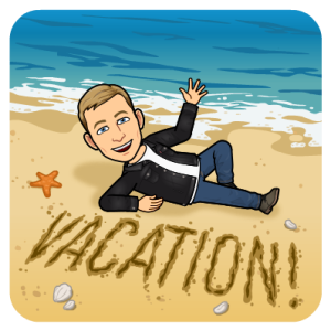 laying down and waving on the beach next to the water, vacation