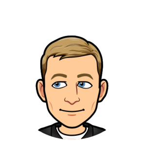 smiling and looking to the left