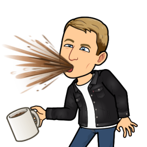 looking shocked spitting out a mouthful of coffee