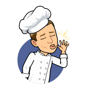 dressed as a chef making chef kiss