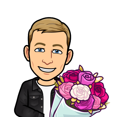 smiling holding a bouquet of flowers