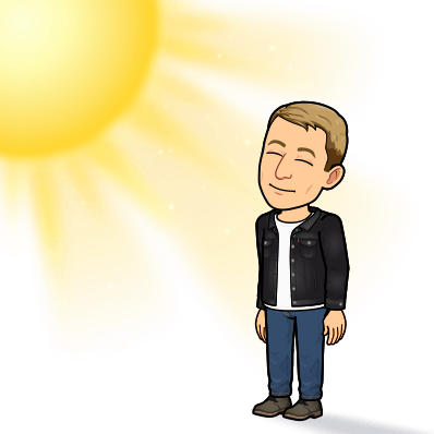 basking directly below sun eyes closed looking content