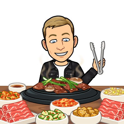 holding tongs in one hand enjoying a plethora of meats at korean bbq