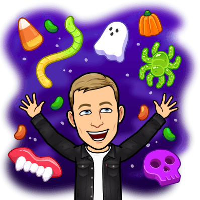 elated expression with arms up in the air surrounded by different halloween candies