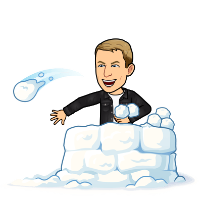 standing in a snow fort throwing snowballs with a mischievous smile