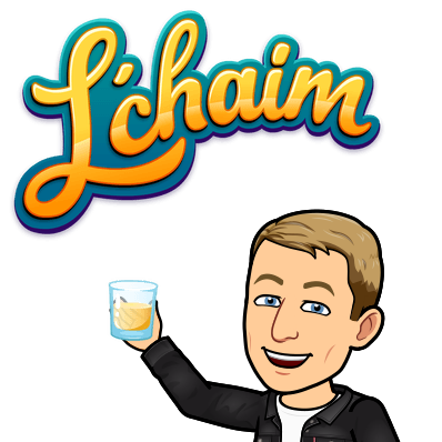 smiling and holding up a drinking glass, l'chaim