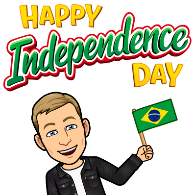 holding a small brazilian flag, happy independence day