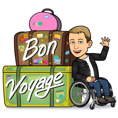 Sitting in a wheelchair waving next to a stack of suitcases, bon voyage