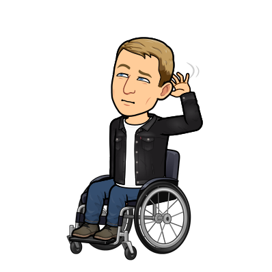 sitting in wheelchair scratching head and looking confused