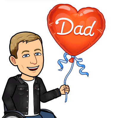 smiling in wheelchair holding a red balloon that says dad