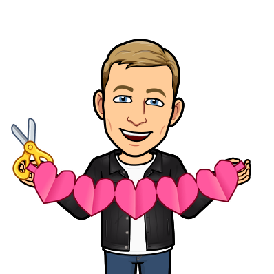 happily holding a cutout row of paper hearts