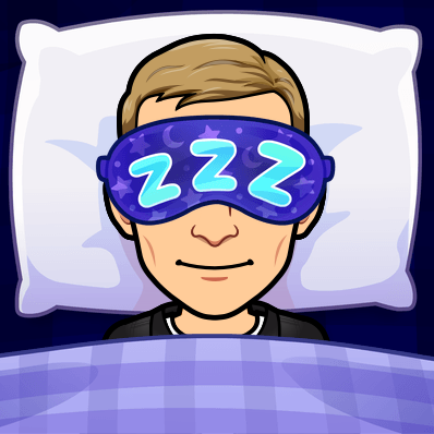 looking comfy in bed wearing a sleep mask, zzz