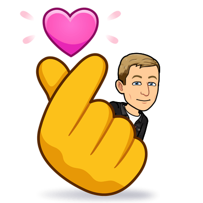 smiling next to a finger heart gesture as a heart bursts above it