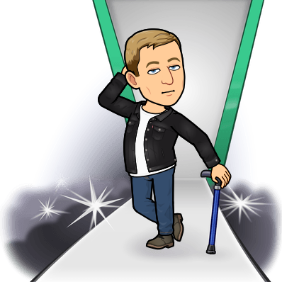 posing on a runway to show off outfit holding cane