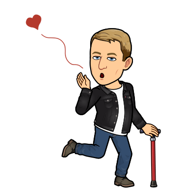 standing holding cane blowing a kiss