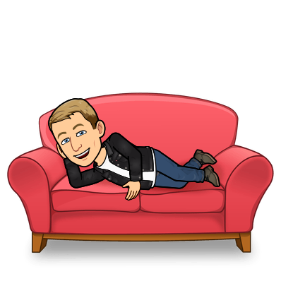 smiling while laying on a couch