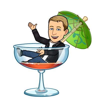 hanging out in a glass with a cocktail umbrella waving