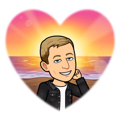 smiling joyfully by the beach as the sunsets framed inside a heart