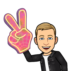 holding a foam hand making a peace sign